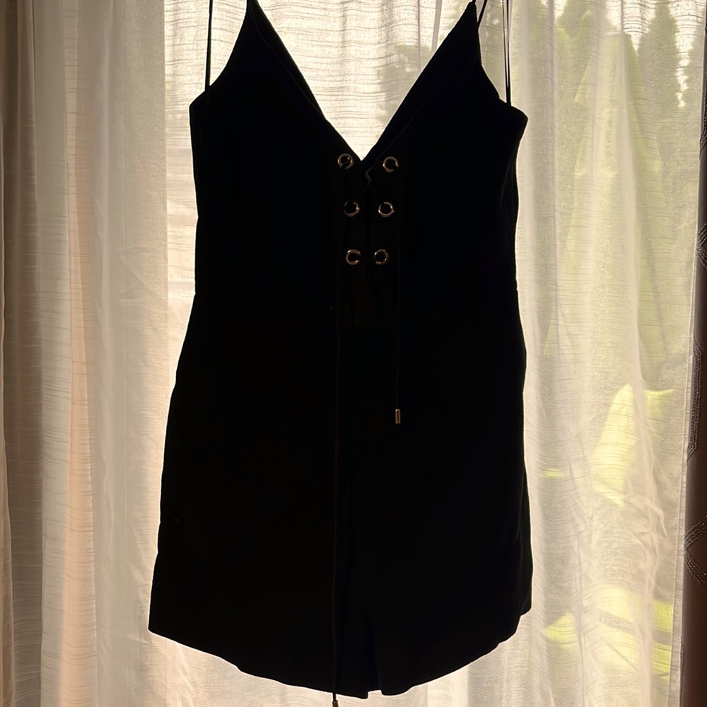 Size small blk romper/shorts.
